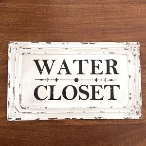 Metal Water Closet sign. 15 1/2” X 9” Off white Distressed paint.